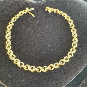 14K Gold and Diamond Infinity Design Women's Tennis Bracelet